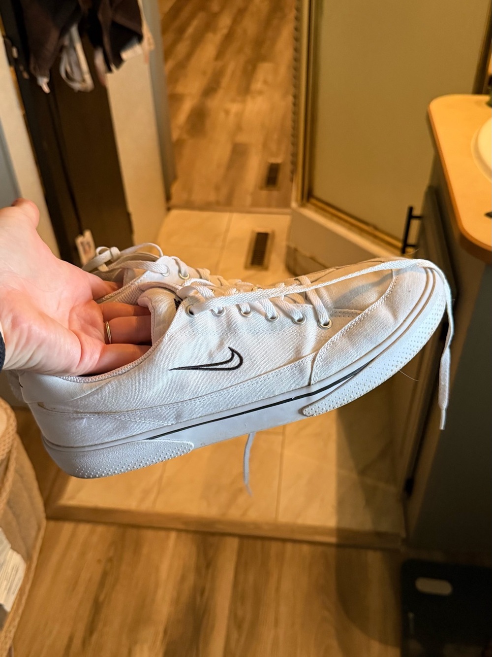 Nike White Canvas Low-Top Sneakers with Black Swoosh